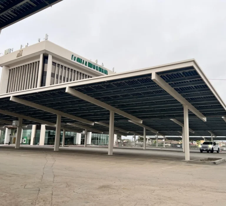 Solar carport box beam structure in bank parking lot