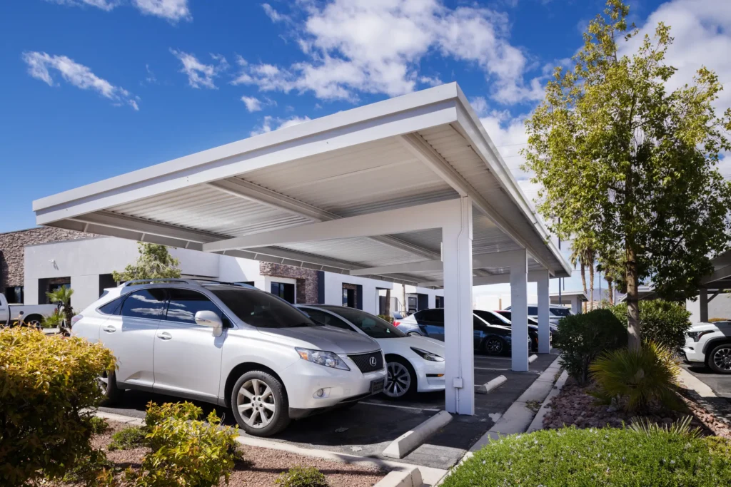 Full cantilever carport structure in parking lot