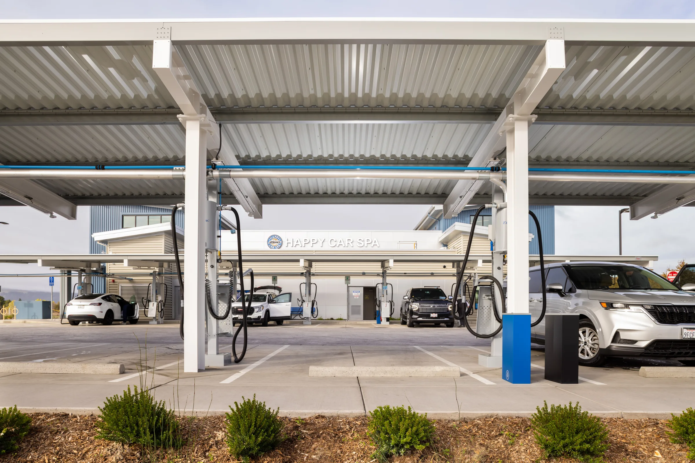 Carport structures in Nissan dealership car wash