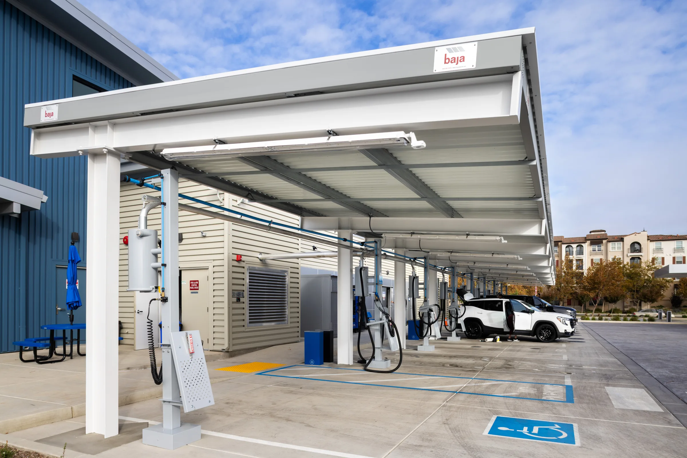 Carport structures in Nissan dealership car wash