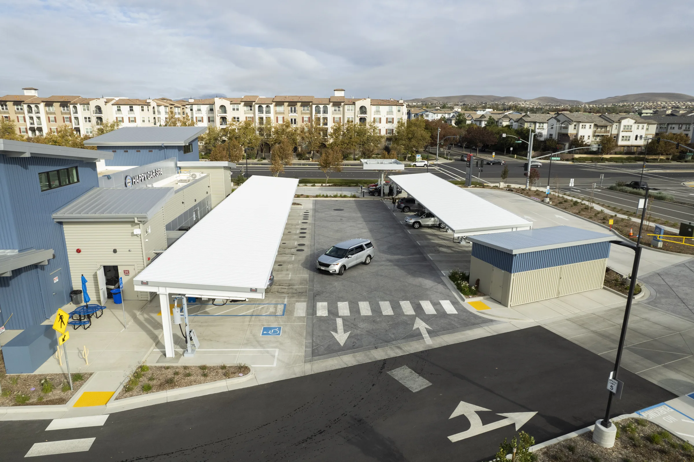 Carport structures in Nissan dealership car wash